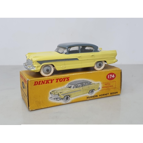 205 - A boxed Dinky Toys No.174 yellow and grey Hudson Hornet, Nr M-M, box VG-E