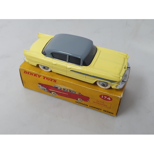 205 - A boxed Dinky Toys No.174 yellow and grey Hudson Hornet, Nr M-M, box VG-E