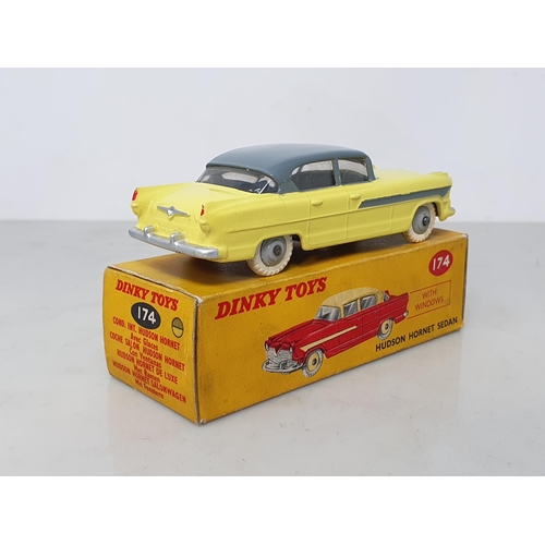 205 - A boxed Dinky Toys No.174 yellow and grey Hudson Hornet, Nr M-M, box VG-E