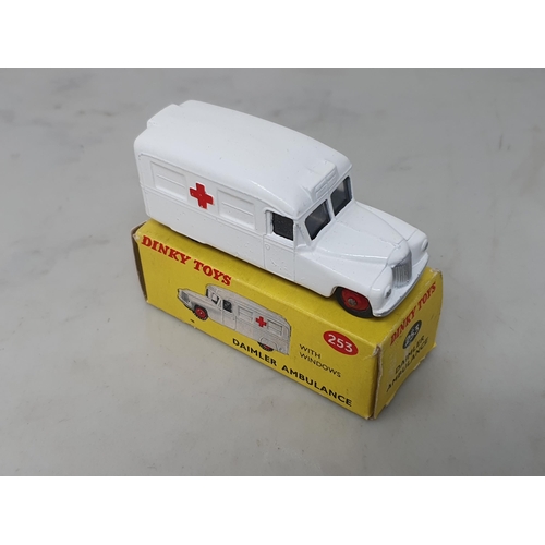 206 - A boxed Dinky Toys No.253 Daimler Ambulance with windows, Nr M, box Ex