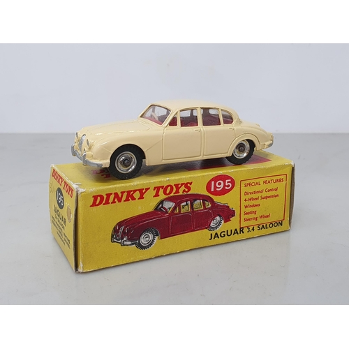 207 - A boxed Dinky Toys No.195 cream Jaguar 2.4l Saloon, box Ex plus