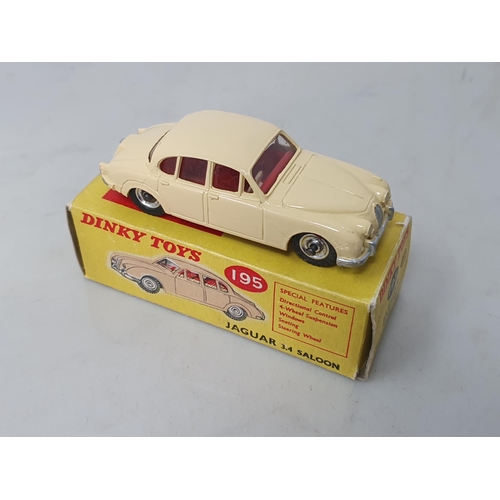 207 - A boxed Dinky Toys No.195 cream Jaguar 2.4l Saloon, box Ex plus