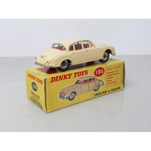 207 - A boxed Dinky Toys No.195 cream Jaguar 2.4l Saloon, box Ex plus