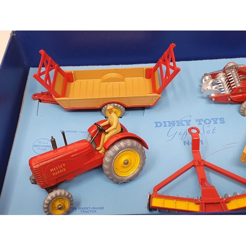 211 - A Dinky Toys No.1 Farm Gear Gift Set, superb throughout. Box has no splits or repairs, base card and... 