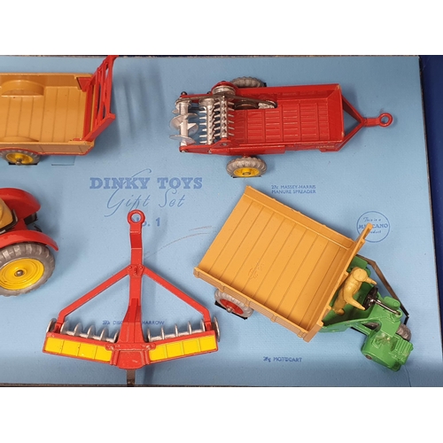 211 - A Dinky Toys No.1 Farm Gear Gift Set, superb throughout. Box has no splits or repairs, base card and... 