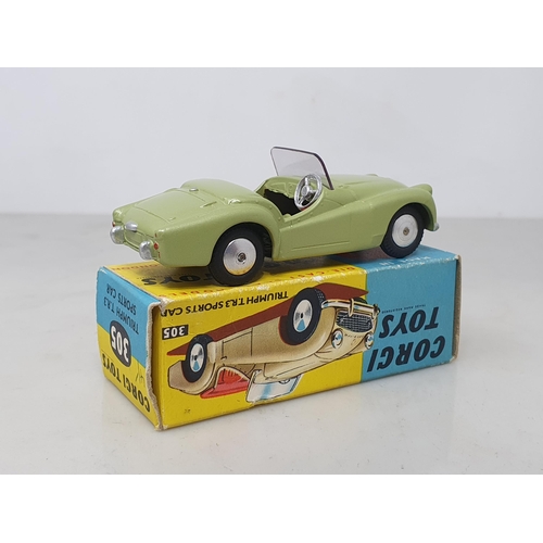 214 - A boxed Corgi Toys No.305 metallic green Triumph TR3, nr M-M, box Ex plus