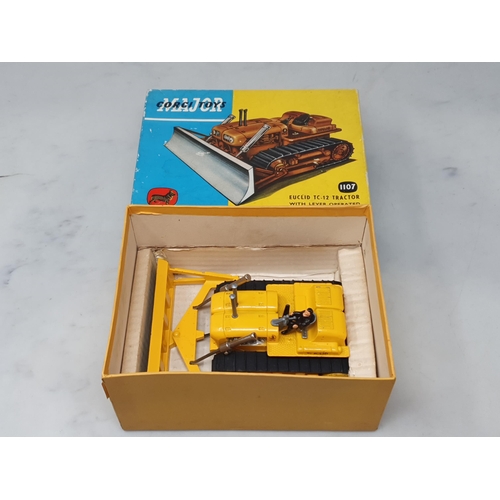 219 - A boxed Corgi Toys No.1107 dark yellow Euclid TC-12, Ex plus, box VG-E with base card