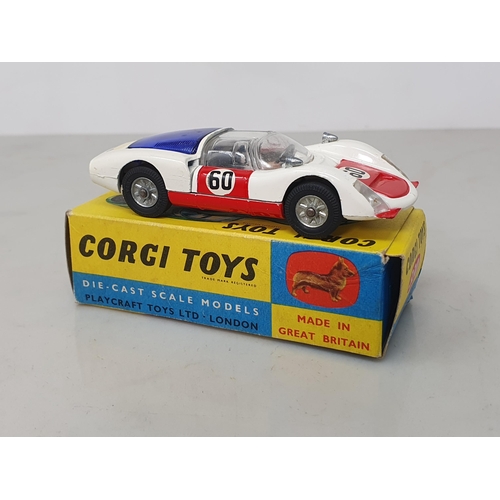 234 - A boxed Corgi Toys No.330 white Porsche Carrera 6, Nr M-M, box EX