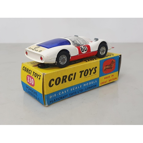 234 - A boxed Corgi Toys No.330 white Porsche Carrera 6, Nr M-M, box EX