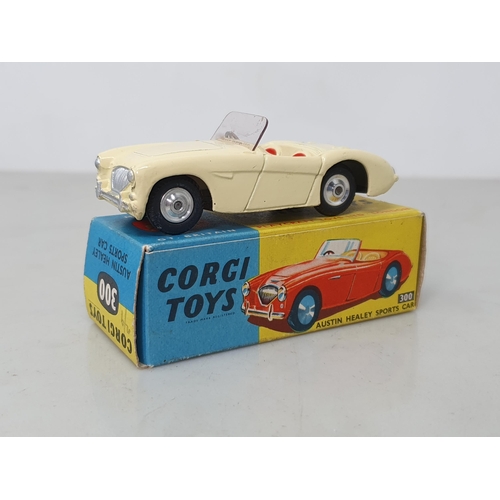 237 - A boxed Corgi Toys No.300 cream Austin-Healey Sports, Nr M-M, box Ex plus