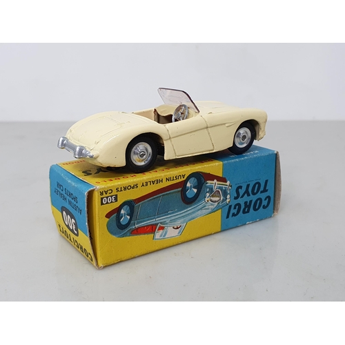 237 - A boxed Corgi Toys No.300 cream Austin-Healey Sports, Nr M-M, box Ex plus