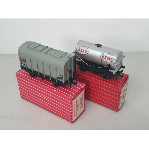 26 - A boxed Hornby Dublo Export 4825 Bulk Grain Wagon and a boxed Export 4876 'Esso' Tank Wagon, unused.... 