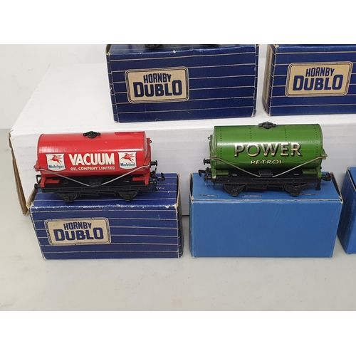 32 - Five boxed Hornby Dublo 3-rail Tankers, mint. Tankers include 'Mobilgas', 'Esso', 'Vacuum', 'Royal D... 