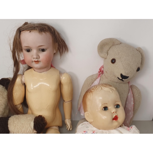 405 - An Armand Marseille 390 bisque headed Doll with sleeping brown eyes, a Mouse Soft Toy, a Teddy Bear,... 