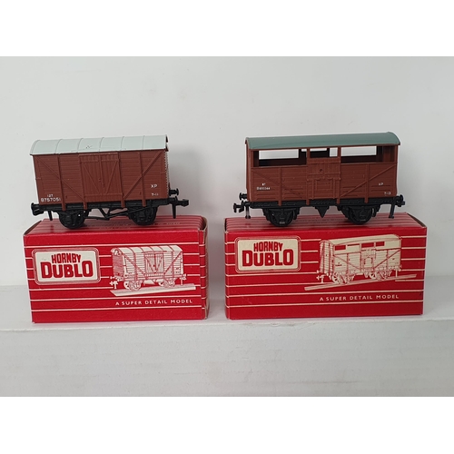 41 - Eight boxed Hornby Dublo 2-rail Wagons, mint, near perfect boxes. Comprising 4318, 4630, 4313, 4320,... 