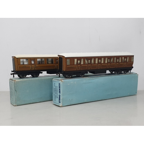 6 - A pair of D1 LNER 1/3rd Corridor Coaches with pale blue boxes. Both coaches in mint condition in 1/4... 