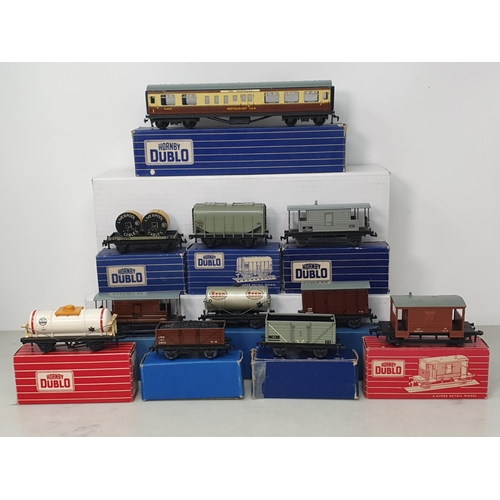 63 - Seventeen boxed Hornby Dublo Wagons and Coaches and fourteen unboxed Wagons and Coaches, condition v... 