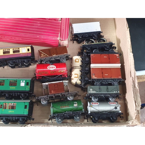 63 - Seventeen boxed Hornby Dublo Wagons and Coaches and fourteen unboxed Wagons and Coaches, condition v... 