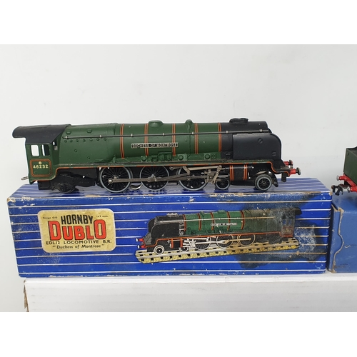 74 - Three Hornby Dublo 3-rail Locomotives including a boxed EDL12 'Duchess of Montrose' with boxed D12 T... 