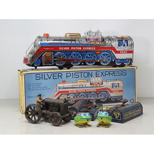 406 - A boxed MT Toys 'Silver Piston Express', two clockwork Frogs, two Postal Telegraph Junior Sets and a... 