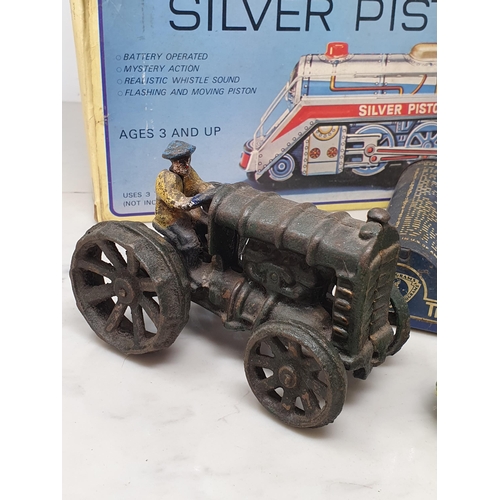 406 - A boxed MT Toys 'Silver Piston Express', two clockwork Frogs, two Postal Telegraph Junior Sets and a... 