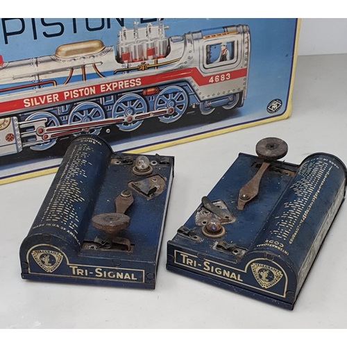 406 - A boxed MT Toys 'Silver Piston Express', two clockwork Frogs, two Postal Telegraph Junior Sets and a... 