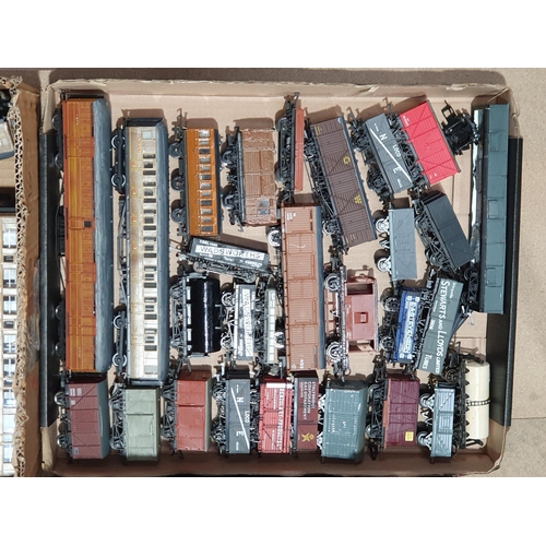 427 - Four boxes of unboxed Hornby, Peco, Bachmann, Lima and other 00 gauge Wagons and LNER teak Coaches (... 