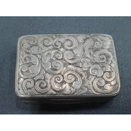 29 - A Victorian silver Vinaigrette with floral and scroll engraving, vacant cartouche, the gilt grille w... 