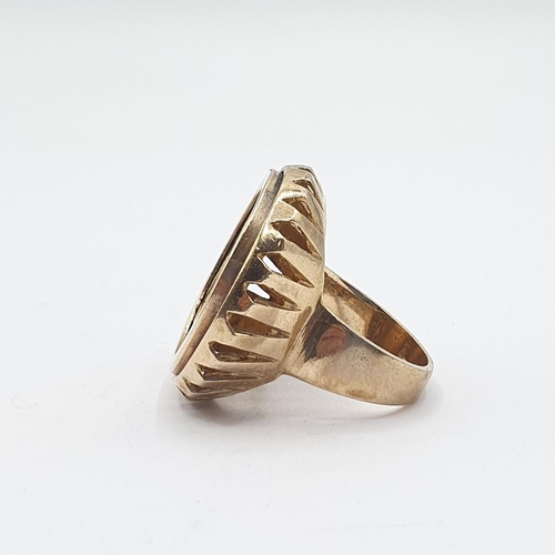 126 - A Victorian Sovereign 1900 in 9ct gold Ring mount, approx 15.80gms all in