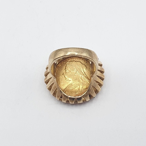 126 - A Victorian Sovereign 1900 in 9ct gold Ring mount, approx 15.80gms all in