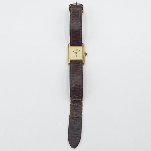 146 - A lady's 1980's Must de Cartier manual wind Wristwatch the rectangular cream dial with black hands a... 