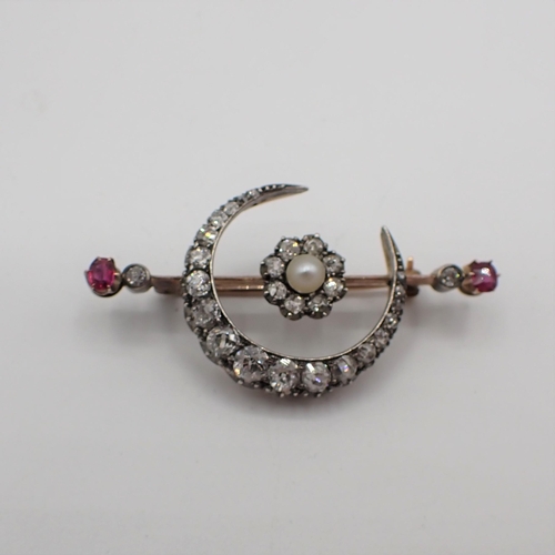 174 - A Victorian Pearl, Diamond and Ruby Crescent and Star Brooch, star having central pearl within old-c... 