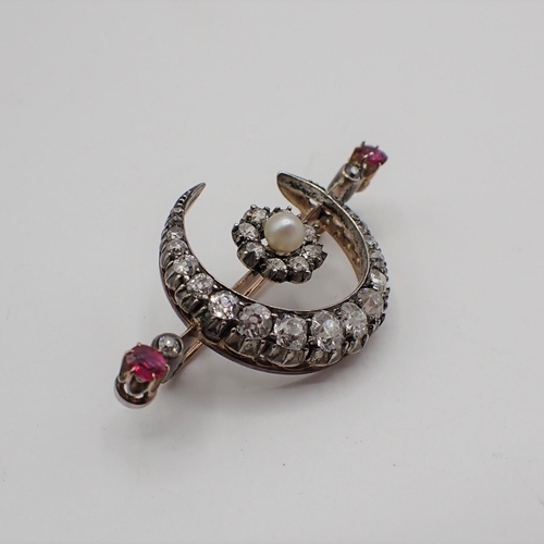 174 - A Victorian Pearl, Diamond and Ruby Crescent and Star Brooch, star having central pearl within old-c... 