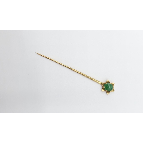 176 - A gold Stick Pin (tests as 22ct) set oval jadeite cabochon in star frame, approx 3.60gms, approx 65m... 