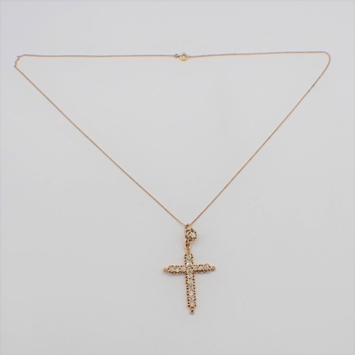 202 - A Diamond Cross set old-cut stones throughout on fine chain, 4cms long, approx 4gms