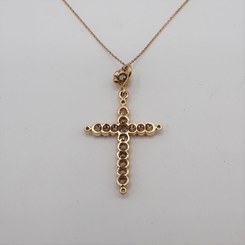 202 - A Diamond Cross set old-cut stones throughout on fine chain, 4cms long, approx 4gms