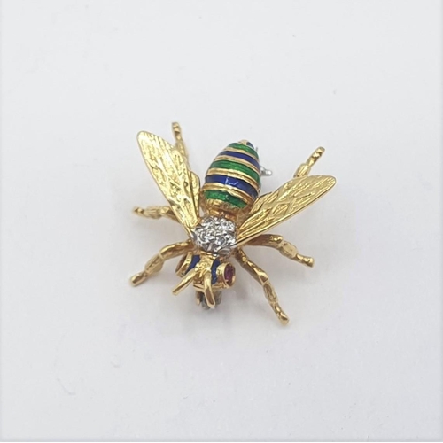 211 - An 18ct gold Bee Brooch set ruby eyes, diamonds to body and blue and green enamel stripes to thorax,... 