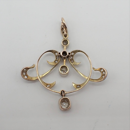 215 - An Art Nouveau Diamond Pendant the openwork plaque millegrain-set old-cut stones within rose-cut sto... 