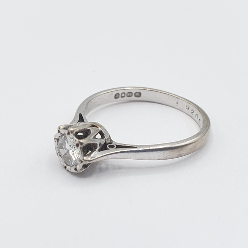 216 - A Diamond single stone Ring illusion-set brilliant-cut stone in 18ct white gold, ring size J, approx... 