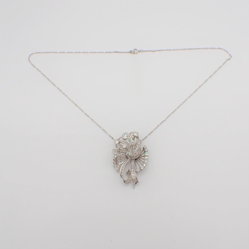 219 - A Diamond flower spray Necklace the openwork plaque claw and millegrain-set brilliant-cut stones thr... 