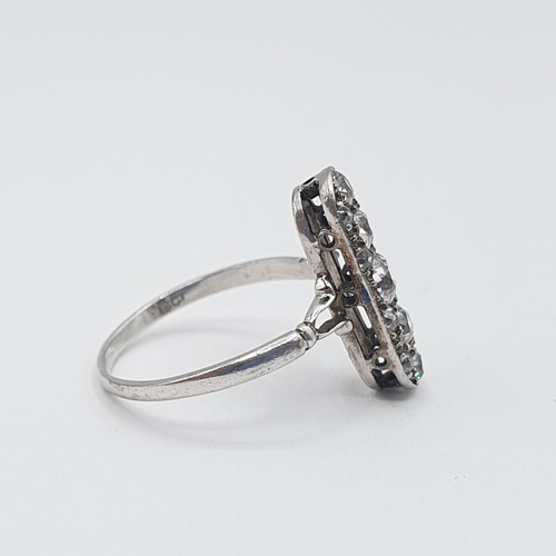 224 - An early 20th Century Diamond five stone Ring pavé-set a column of graduated old-cut stones between ... 