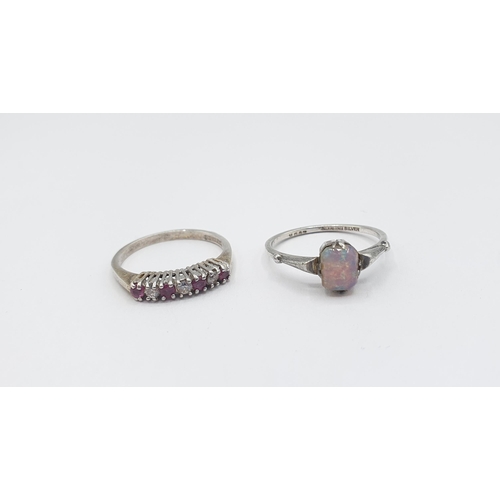 229 - A silver Ring set rubies and white stones and a Dress Ring set opalescent stone, stamped Sterling Si... 