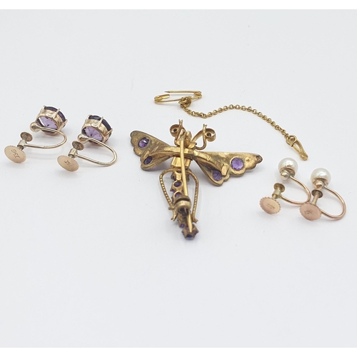 231 - An Amethyst and Seed Pearl Dragonfly Brooch with ruby eyes, in silver gilt stamped 830, a pair of Am... 