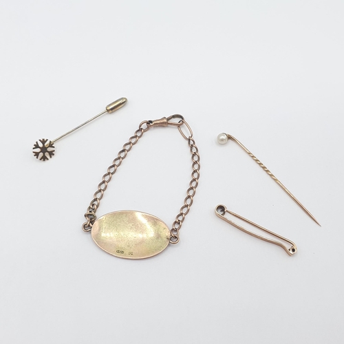 233 - An Identity Bracelet stamped 9ct, a Bar brooch and two Stick Pins, approx 9gms all in