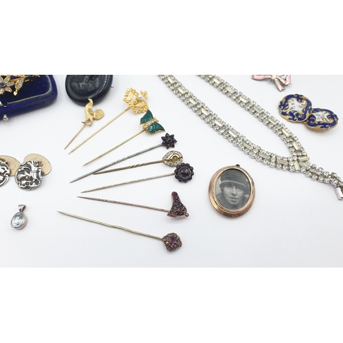 238 - A collection of antique and vintage Costume Jewellery including; Stick Pins, jet Cameo Brooch etc