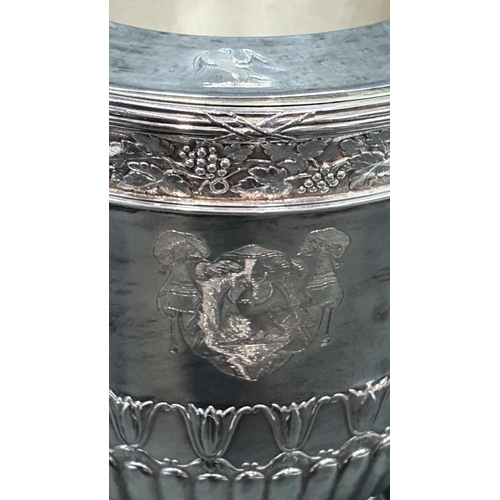 119 - A George III silver Wine Cooler with fruiting vine friezes, leafage scroll and ring handles, semi-ga... 