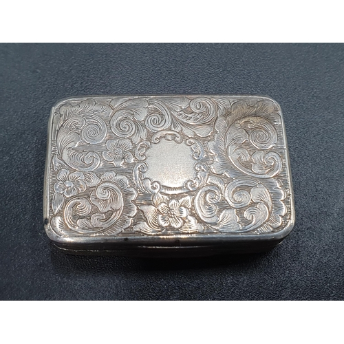 29 - A Victorian silver Vinaigrette with floral and scroll engraving, vacant cartouche, the gilt grille w... 