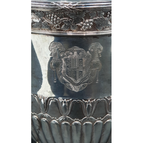 119 - A George III silver Wine Cooler with fruiting vine friezes, leafage scroll and ring handles, semi-ga... 