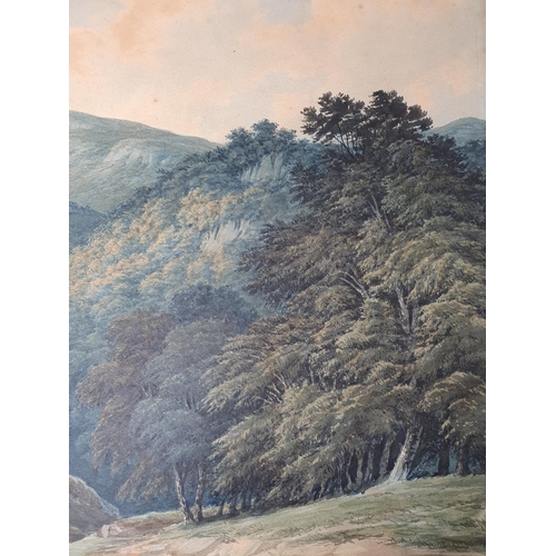 290 - JOHN GLOVER OWCS (1767-1849). An extensive wooded valley landscape with buildings under trees, water... 