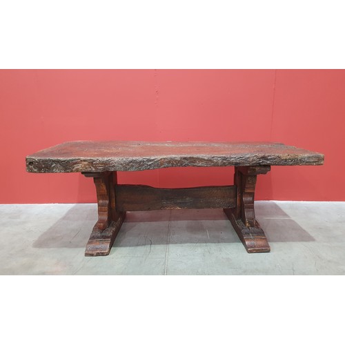 483 - An old rustic oak Refectory Table with very thick top on later trestle base with stout square suppor... 